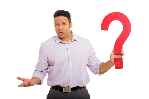 Man holding question mark